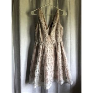 Lulu’s lacy dress (low cleavage), size medium.